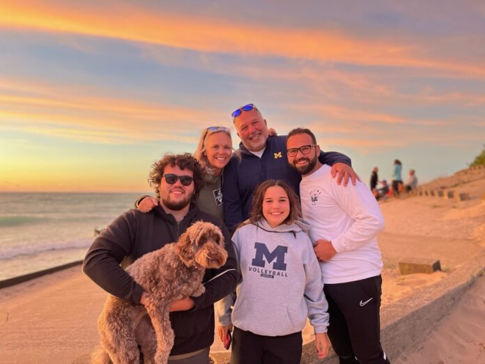 Gerald Vazquez and his family on the beach