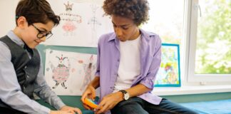 Teens playing with fidget toys