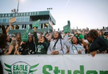 students at football game